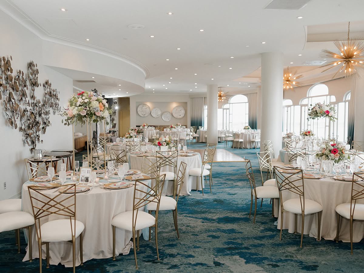 A romantic waterfront Loews Coronado Bay Resort wedding for Irma and CJ in Coronado, planned by Bliss Events.