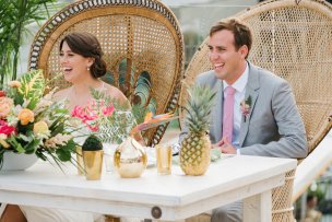Kelly and Kyle happy at their Modern Tropical style wedding